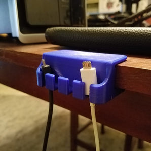 Praktický držák USB Micro kabelu na stůl