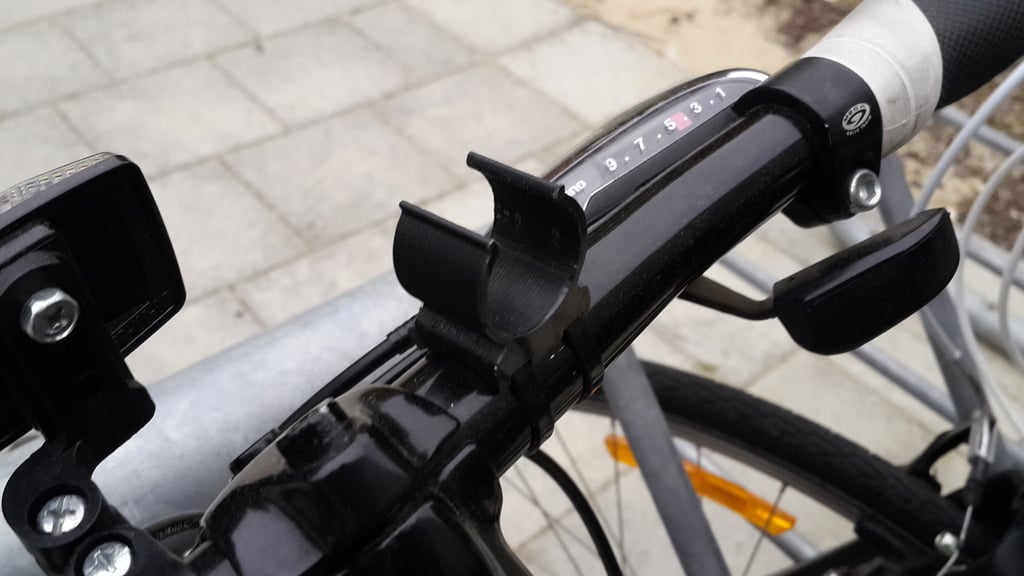 Bike Torch Clamp - Držák svítilny na jízdní kola na řídítka kola