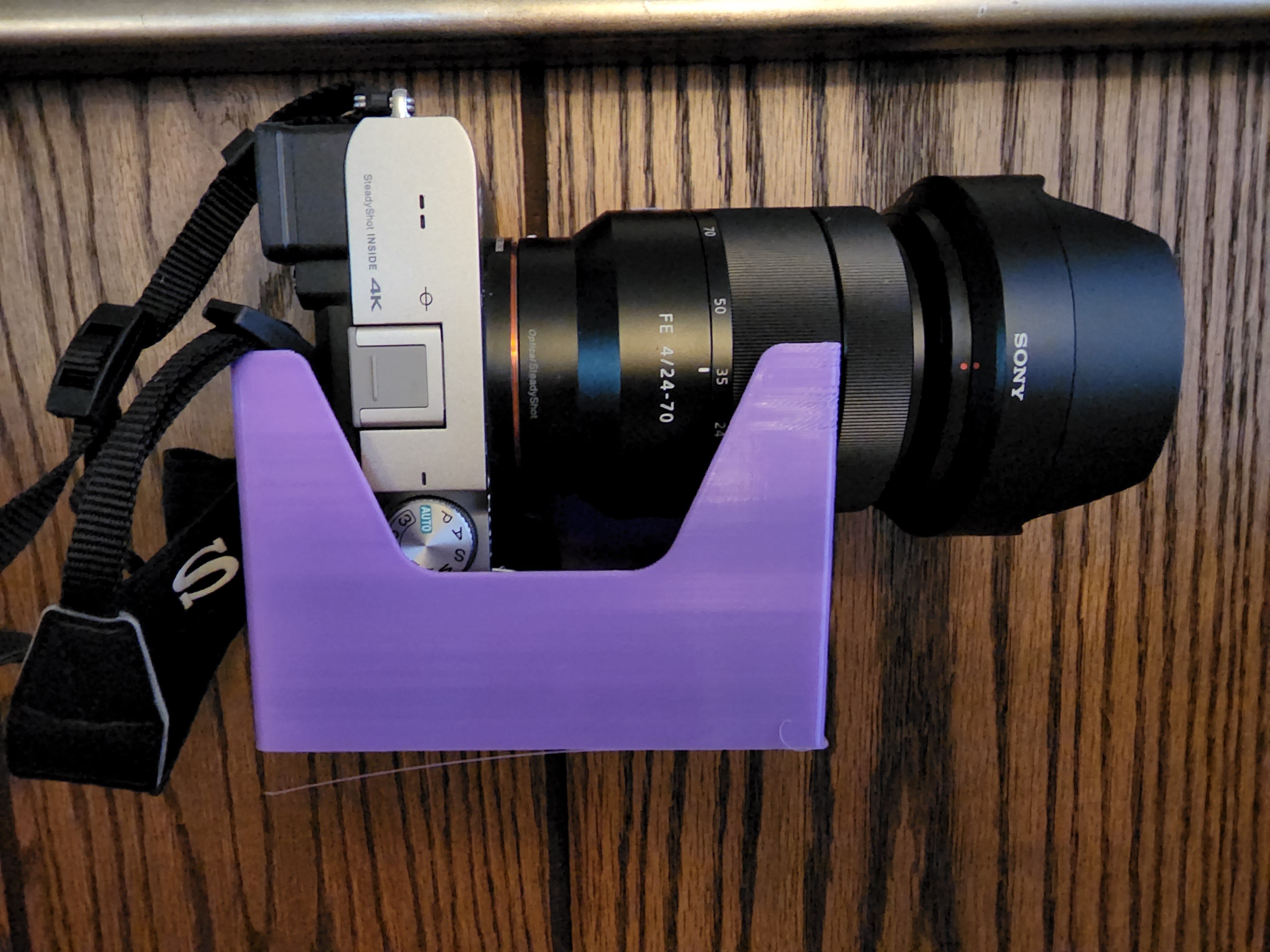 Nástěnný držák fotoaparátu Sony A7C