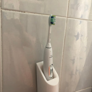 Nástěnný držák na zubní kartáček Philips Sonicare s nabíječkou