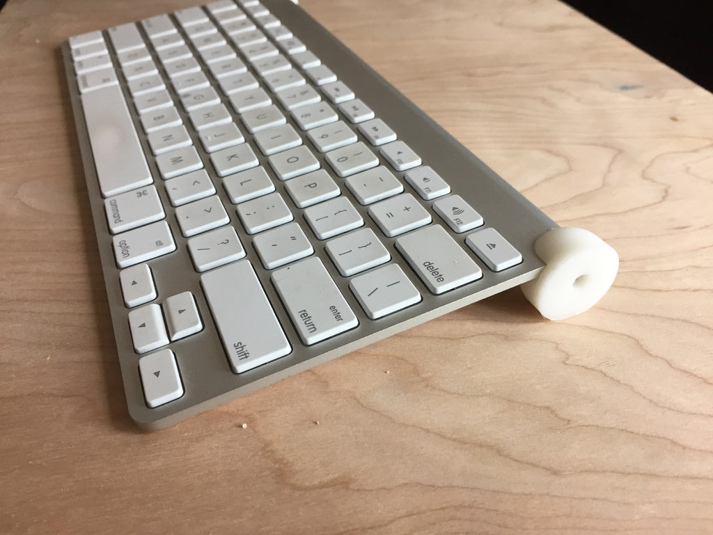 Kryt tlačítka napájení bezdrátové klávesnice Apple