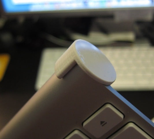 Kryt tlačítka napájení pro bezdrátovou klávesnici Apple