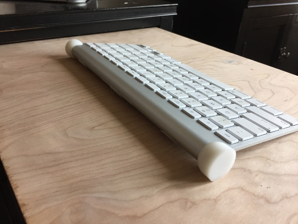 Kryt tlačítka napájení bezdrátové klávesnice Apple