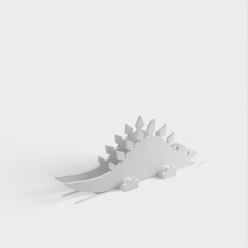 Přizpůsobitelný držák na ubrousky Stegosaurus