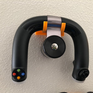 Nástěnný držák pro bezdrátové rychlostní kolo Xbox 360