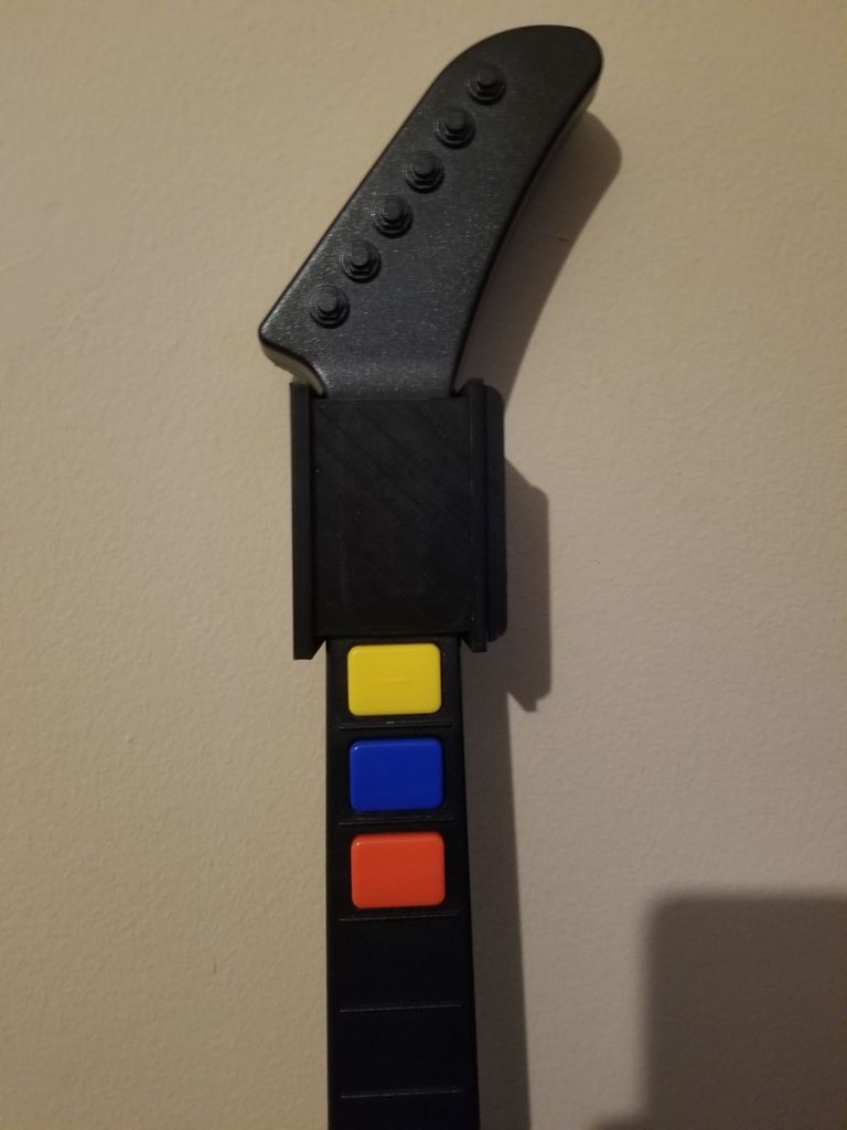 Nástěnný věšák pro Guitar Hero Xplorer V2