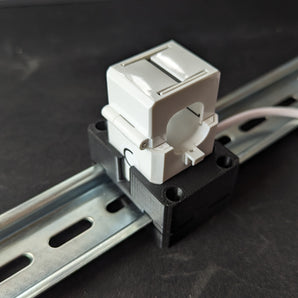 DIN držák na měřící cívky Shelly 3EM