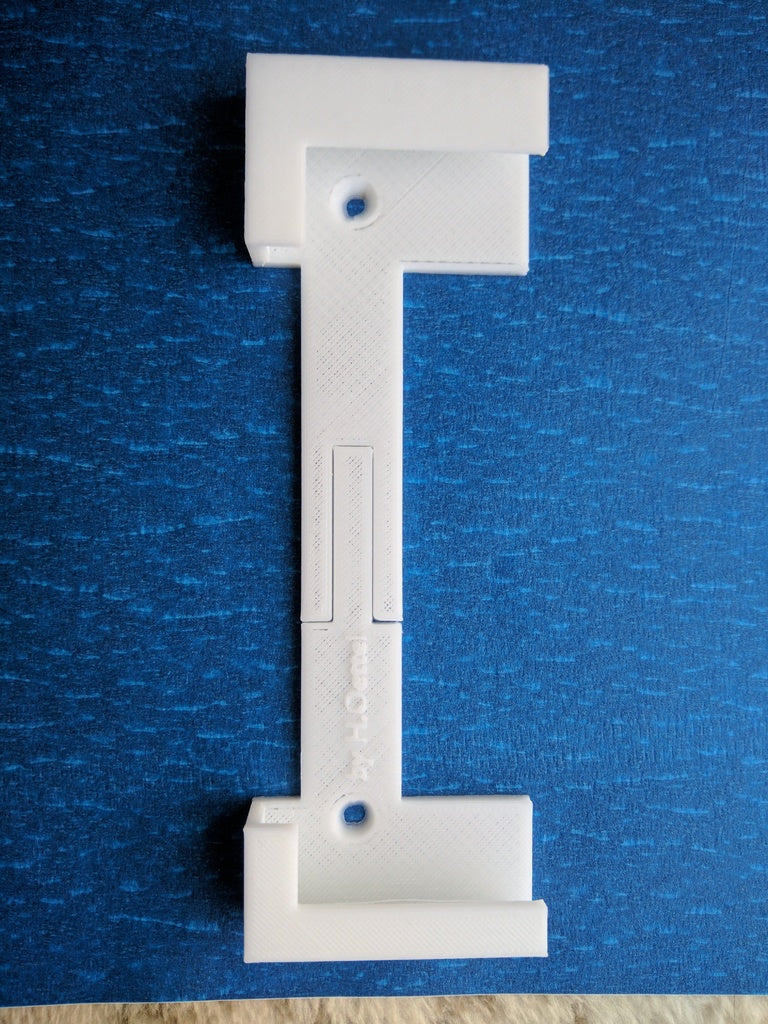 Flexibilní držák na stěnu pro tablet s bezpečnou rohovou sponou