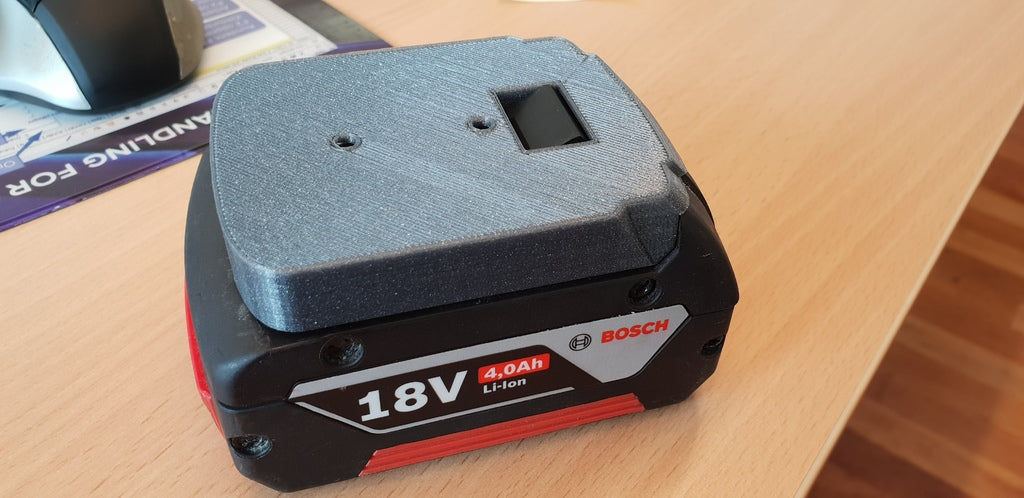 Nástěnný držák pro profesionální baterii Bosch 18V