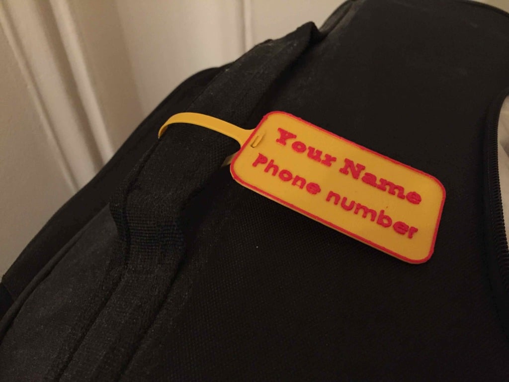 Štítek na zavazadla pro personalizaci se jménem a telefonním číslem