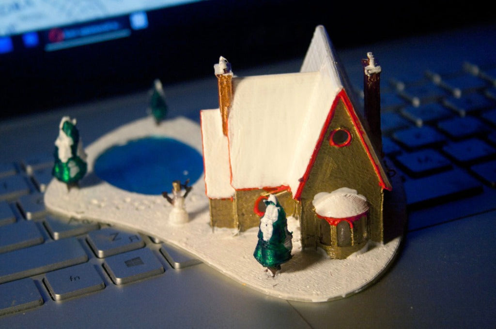 Vánoční dům se zamrzlým jezerem na 3D tisku