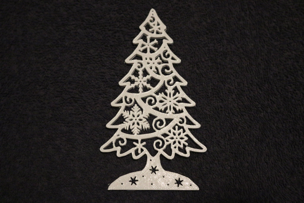Vánoční strom s ornamenty sněhové vločky