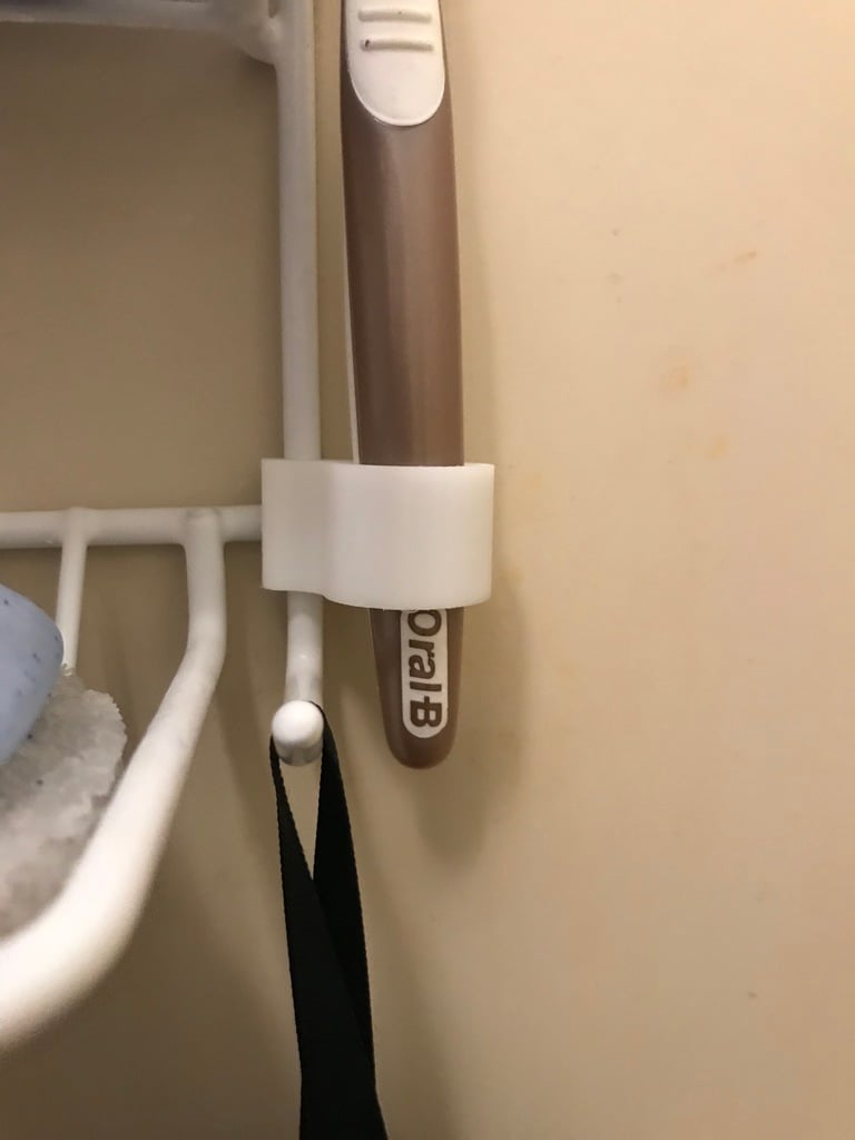 Držák na zubní kartáčky pro drátěnou sprchovou polici