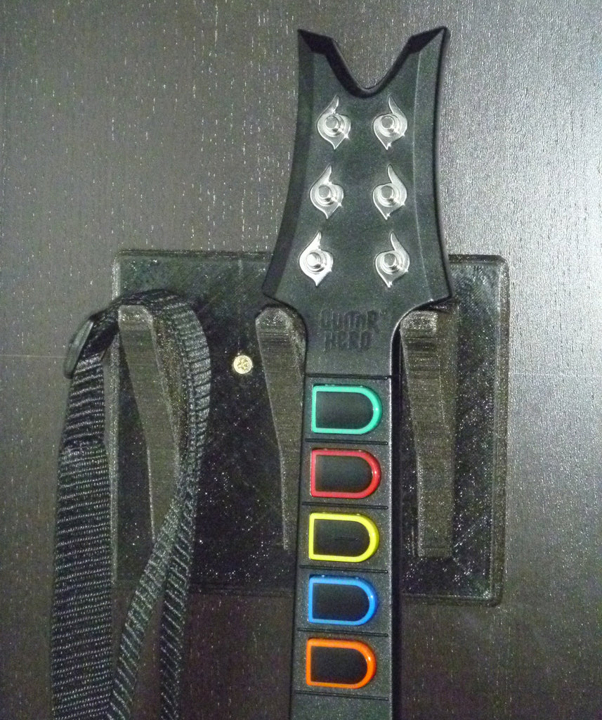 Nástěnný držák pro Guitar Hero s přídavným háčkem na popruh