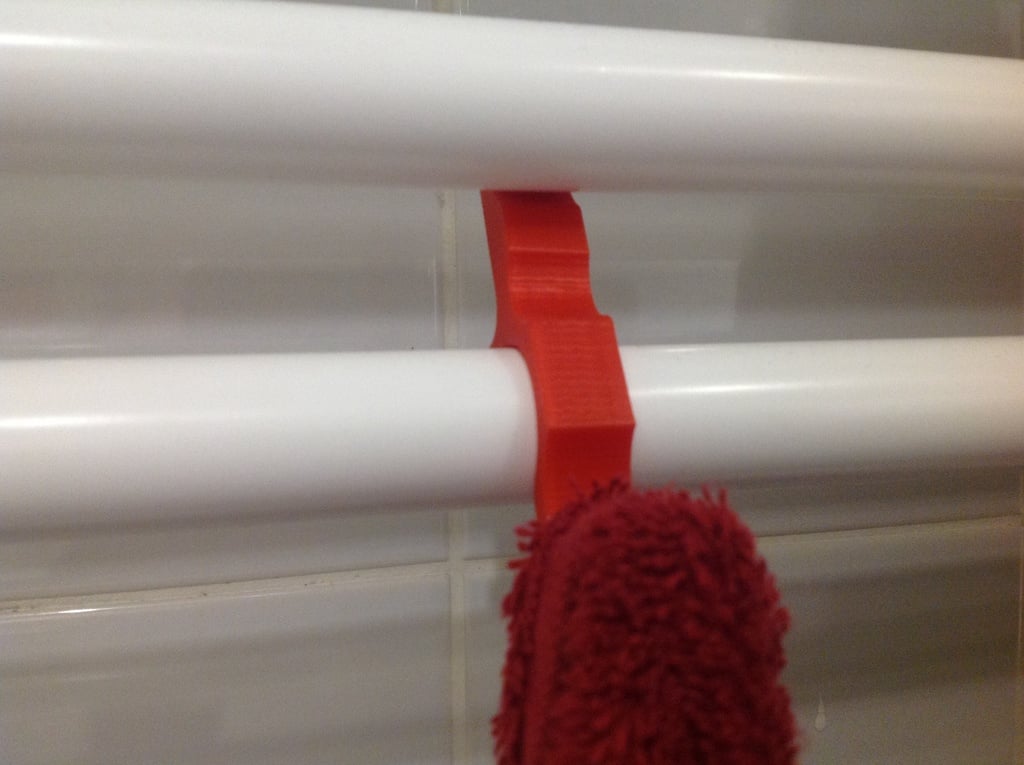Designový háček na ručník na radiátor