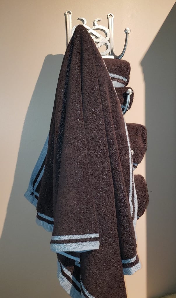 Propojený věšák na ručníky do koupelny