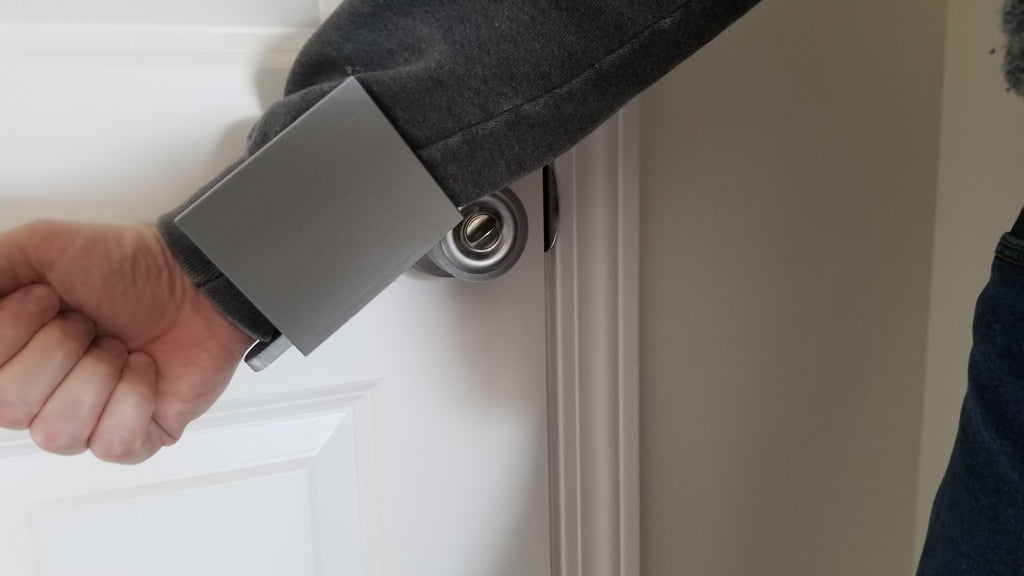 Adaptér pro otevírání dveří s rukávem