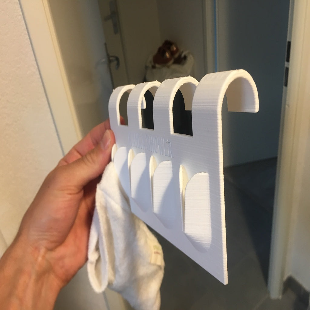 Držák ručníku pro koupelnové topení