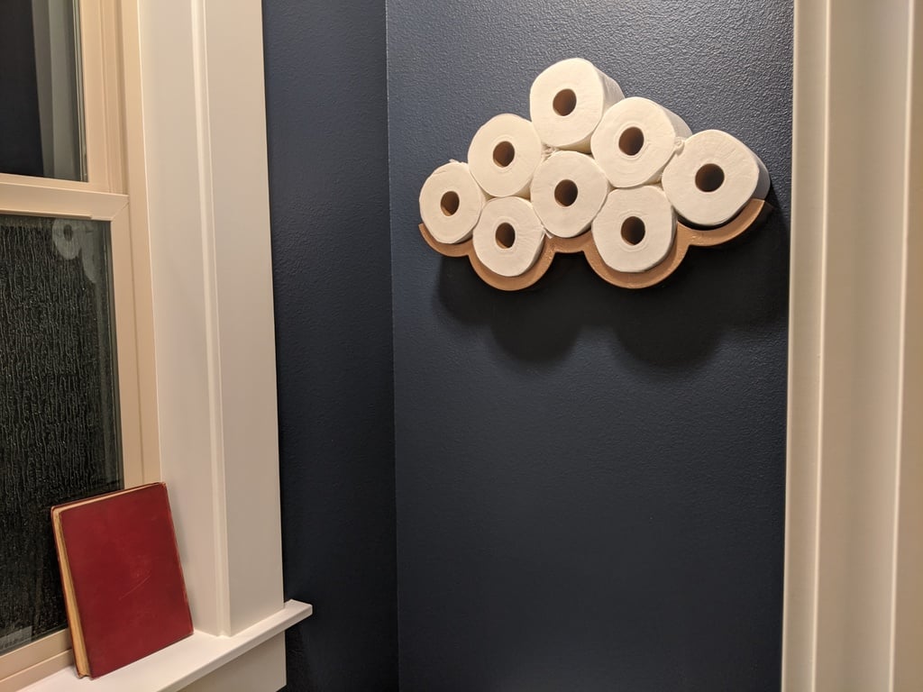 Držák na toaletní papír ve tvaru obláčku