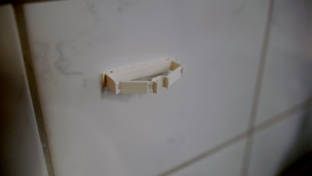 Kompatibilní držák na zubní kartáčky s flexibilním mechanismem