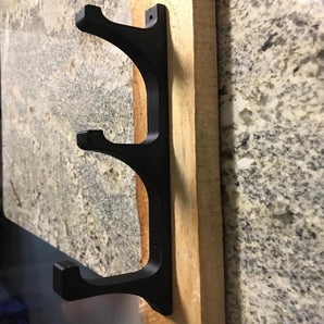 Nástěnný držák na rybářské pruty