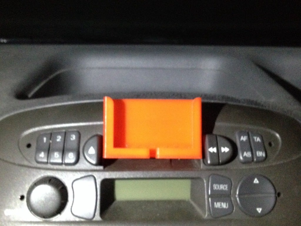 Držák kazetového přehrávače pro iPhone/smartphone do auta